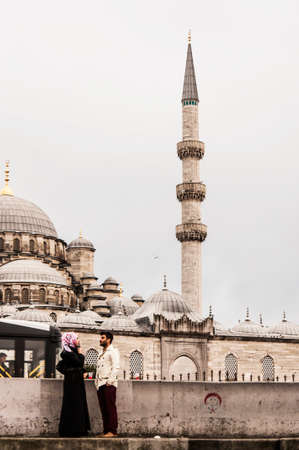 ISTANBUL, TURKEY - FEBRUARY 02  turkish young couple outside of a mosque on February 02, 2013 in Istanbul, Turkeyのeditorial素材