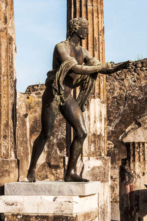 bronze statue inside the pompeii ruins, italyの写真素材