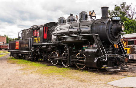 NORTH CONWAY - JULY 24: old fashioned locomotive in a train depot on July 24, 2014 in North Conway, NH, Usaのeditorial素材
