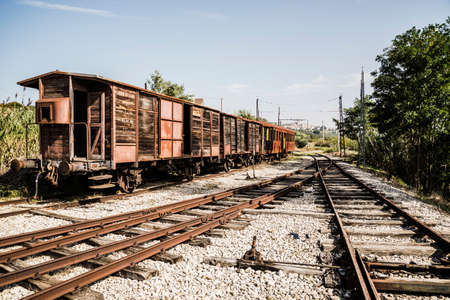 dismissed train in an abandoned rail station in Italyのeditorial素材
