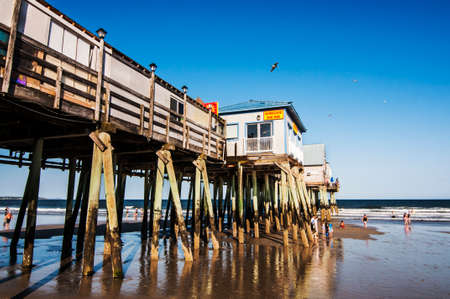 OLD ORCHARD BEACH - JULY 22: Old pier and its entartainments on the Maine coastline on July 22, Old Orchard Beach, Maine 2012のeditorial素材