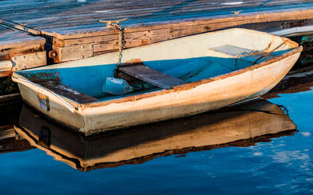 a small boat on the oceanic coast in Maine, USA
