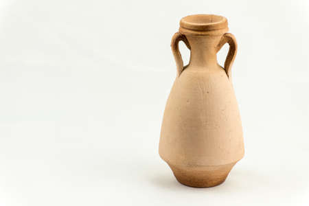 Ancient terracotta vase isolated on white background