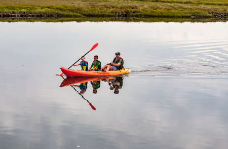 WELLS, ME - AUGUST 21: Family kayaking in winter on the coast of Maine on August 21, 2014 in Wells, Maine USAのeditorial素材