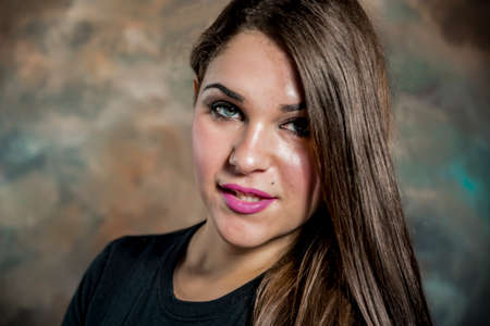 beautiful young woman in a close-up portraitの写真素材