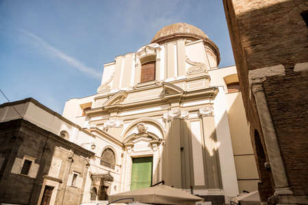 The Church of Santa Maria Maggiore with red-brick belfry is the oldest free-standing tower of its kind in the city, located on Piazza Miraglia in Naples, Italyの写真素材