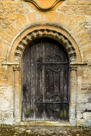 The beautifully detailed doorway of a British churchの写真素材