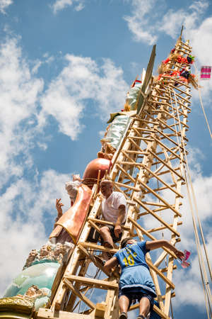 NOLA, ITALY - JUNE 28, 2015: the Gigli Feast is a popular festival in Nola, Italy during of the celebrations for St.Paul. It consists of a historical parade of lilies, heavy wooden obelisks 25 mt high on June 28, 2015 in Nola, Italyのeditorial素材