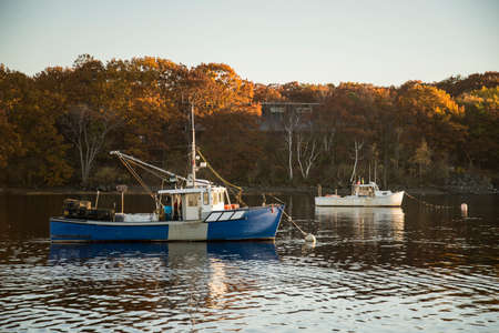 a small boat on the oceanic coast in Maine, USAの写真素材