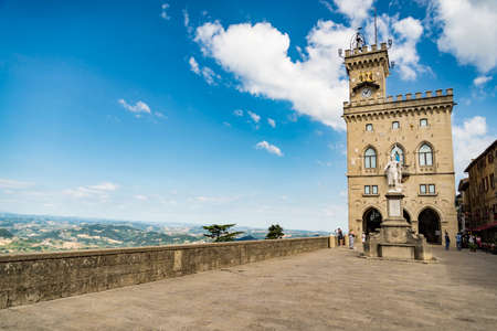 San Marino - June 18: Central square of San Marino with the Public Palace and statue of Liberty on...