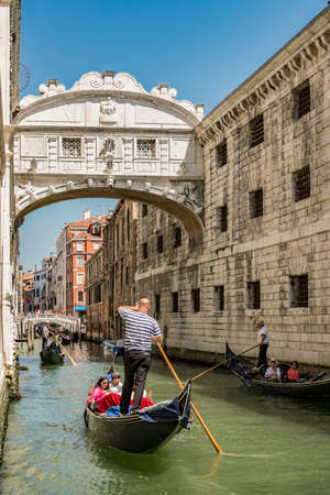 VENICE, ITALY - JULY 01: view of Bridge of Sighs with gondolas on July 1, 2017 in Venice Italyのeditorial素材
