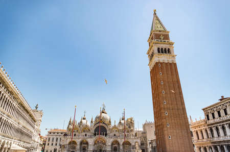 VENICE - JULY 1: San Marco square with Campanile and Saint Mark's Basilica. The main square of the old town on July 1, 2017 in Venice, Italy.のeditorial素材
