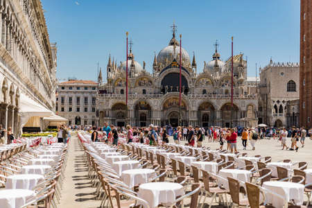 VENICE - JULY 1: San Marco square with Campanile and Saint Mark's Basilica. The main square of the old town on July 1, 2017 in Venice, Italy.のeditorial素材