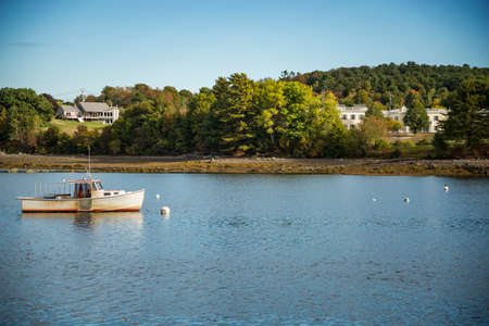 Seascape panorama, showing small fishing boats anchored in the bay. Maine, USAの写真素材