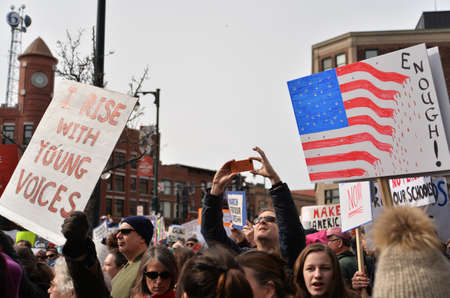 Portland, ME - March 24, 2018: National School Walkout Student Protester Holding Sign, on March 24,...