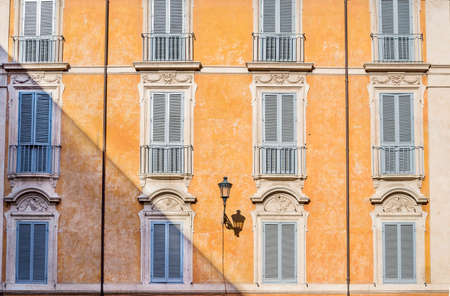 Stylish facade and windows of the traditional buildings in Rome, Italyのeditorial素材