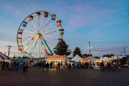 FRYEBURG ME - OCTOBER 4: People enjoy the fair, the theme park and vendors on October 4, 2015 in...