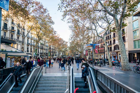 BARCELONA, SPAIN - DECEMBER 19, 2018: La Rambla in Barcelona, Spain. La Rambla is a street in central Barcelona, between El Raval and Barri Gotic districtのeditorial素材
