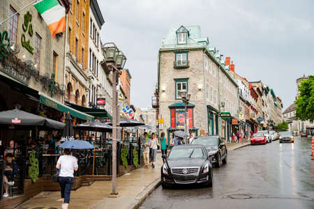 QUEBEC CITY - JUNE 1: Old street with traffic on June 1, 2018 in Quebec City, Canada. As the capital of the Canadian province of Quebec, it is one of the oldest cities in North America.のeditorial素材