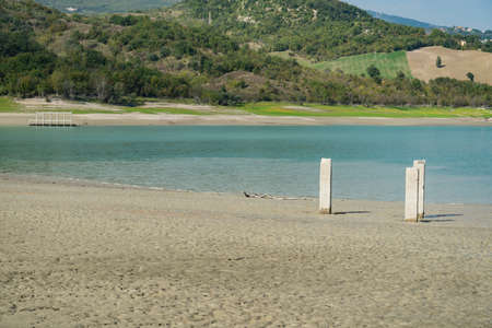 Lake Campotosto embedded in the Gran Sasso and Monti della Laga National Park, Abruzzo, Italyの写真素材