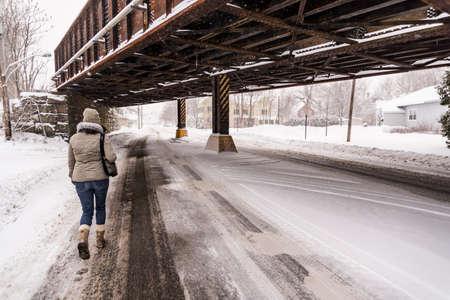 Street full of snow in the wintertime in the town of Saco, Maineの写真素材