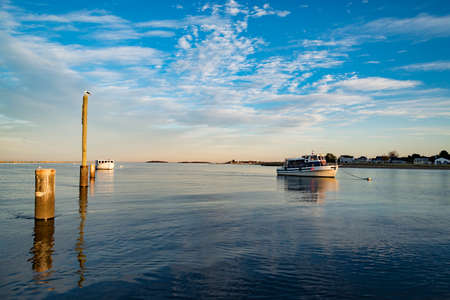 a small boat on the oceanic coast in Camp Ellis in Maine, USA