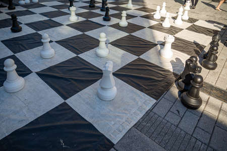 MONTREAL - CANADA, MAY 27, 2017: Giant Chess Set outdoors surrounded by people in the city centre of Montrealのeditorial素材