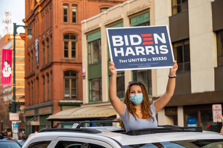 PORTLAND, MAINE, USA - 07 NOVEMBER, 2020: Mainers celebrate Joe Biden's victory of the 2020 United States presidential election in downtown Portland Maine.のeditorial素材