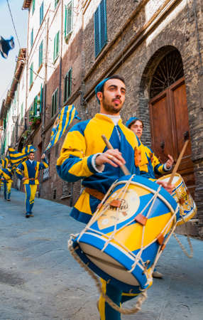 SIENA, ITALY - JUNE 16, 2013: competitions of the flag wavers and the parade of the districts,...