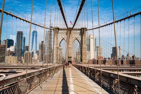 NEW YORK CITY - JULY 17, 2021: View of the Broklyn skyline as seen from the Brooklyn Bridge.のeditorial素材