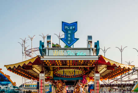 OLD ORCHARD BEACH, MAINE - AUGUST 24, 2014: People enjoy the theme park playland, which is a...