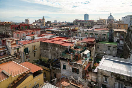 Old overcrowded apartment buildings with balconies - dense living in overpopulated Napoli center, Italyの写真素材