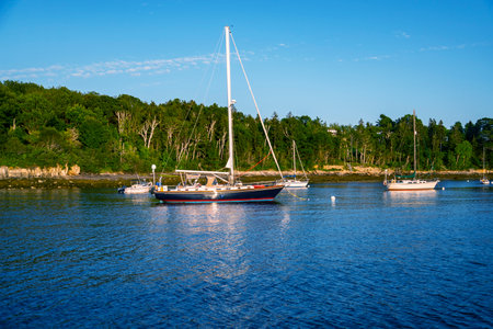 Boats and warehouse on a dock on the Maine coast fishing port