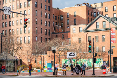 People Stands On Demonstration, Protest Against The Russian War Invasion In Ukraine. IN Portland ME, USAのeditorial素材
