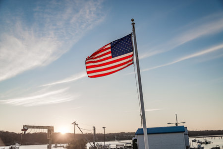 American flag with water on the backgroundの写真素材