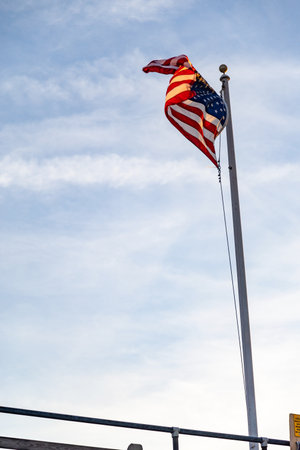 American flag with water on the backgroundの写真素材