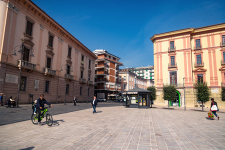 people enjoy the Sunday morning in the central Piazza LiberÃ  in Avellino, Italyのeditorial素材