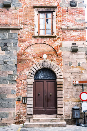 Italian Door. Old Italian street of a small town of Lucca in Tuscany. Italyの写真素材
