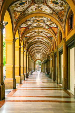 Beautifully decorated porticoes in Bologna, during a sunny day in the summer.の写真素材