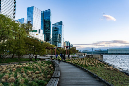 Hudson River and wooden walkway at Hudson River park, New York, USAの写真素材