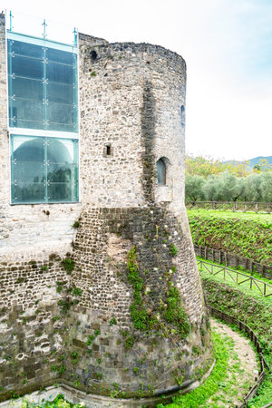 Old medieval Aragonese Castle surrounded by green fields in Calvi Risorta, Caserta province, Italyの写真素材