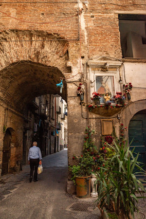 Naples, Italy May 3, 2025: Naples, a journey through the beautiful historic center, a World Heritage Site among alleys, shops and people.の写真素材