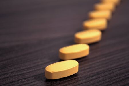 Drug tablets in a row