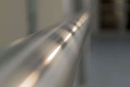 Sun reflection in metal handrailの写真素材