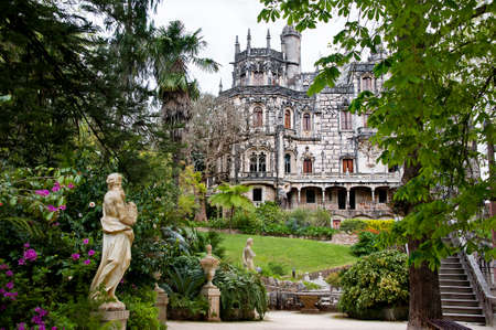The palace of ?Quinta la Regaleira? viewed from the gardens, in Sintra, Portugalのeditorial素材