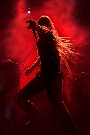 Spanish heavy metal singer in backlightの写真素材