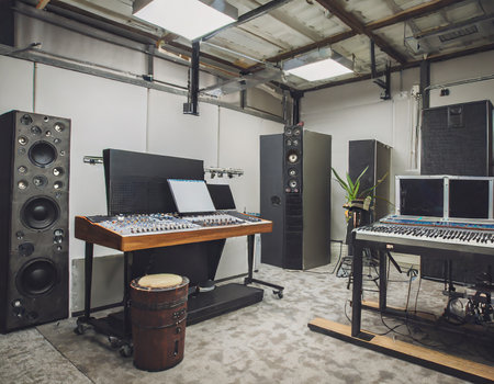 Interior of a recording studio with sound equipment and music equipment.の素材