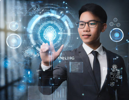 Businessman pressing high tech type of modern buttons on a virtual backgroundの素材