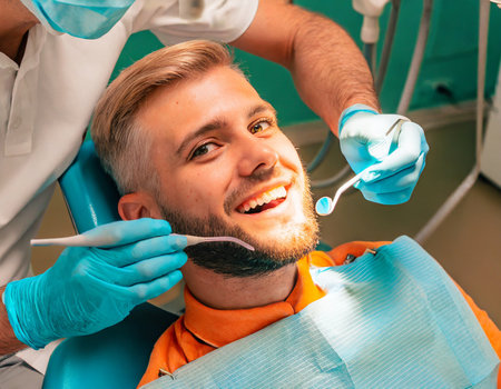 Dentist and patient in the dentists office. Dentistry concept.の素材