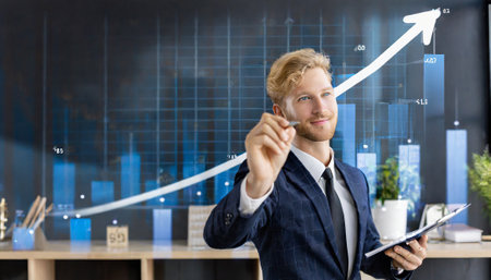 Portrait of confident young businessman in office. Success and growth conceptの素材